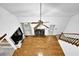 Open living room with hard wood floors and a fireplace at 842 Laurel Crest Sw Ct, Marietta, GA 30064