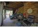 Enclosed patio with brick flooring, comfortable seating, and a relaxed atmosphere at 842 Laurel Crest Sw Ct, Marietta, GA 30064