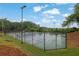 Community tennis courts surrounded by lush greenery, offering recreational opportunities at 842 Laurel Crest Sw Ct, Marietta, GA 30064