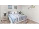 This charming bedroom features nautical-themed decor and a comfortable bed at 112 Leveret Rd, Locust Grove, GA 30248