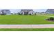 Well-maintained front yard with lush green grass, showcasing the home's curb appeal at 112 Leveret Rd, Locust Grove, GA 30248