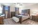 Main bedroom with furniture and lots of natural light at 112 Leveret Rd, Locust Grove, GA 30248