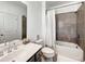 Stylish bathroom featuring a shower-tub combo with tile surround and a modern vanity at 1127 Provence Ln, Decatur, GA 30033