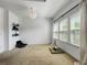 Comfortable room with natural light, and space for yoga or meditation at 1127 Provence Ln, Decatur, GA 30033