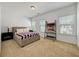 Cozy bedroom with a double bed, natural light, and a small desk at 1127 Provence Ln, Decatur, GA 30033
