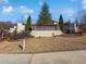 Community entrance to Dumont Place with attractive brick signage and landscaping at 1127 Provence Ln, Decatur, GA 30033