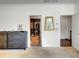 Hallway with view of a dressing table and closet at 1127 Provence Ln, Decatur, GA 30033