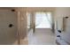 Close up of shower and soaking tub with custom curtain at 2209 Cedar Place Ct, Snellville, GA 30078