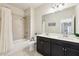 Bathroom with shower/tub combination and double sink vanity at 2793 Bloom Cir, Dacula, GA 30019