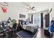 Nicely decorated bedroom with large bed, fan and hardwood floors at 2793 Bloom Cir, Dacula, GA 30019