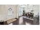 Bright entryway featuring hardwood floors leading into the dining room at 2793 Bloom Cir, Dacula, GA 30019