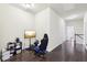 Spacious hallway with hardwood floors and open view of the staircase at 2793 Bloom Cir, Dacula, GA 30019