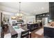 Open-concept kitchen and dining area with stainless steel appliances at 2793 Bloom Cir, Dacula, GA 30019