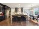 Spacious kitchen with stainless steel appliances, large island, and dark cabinets at 2793 Bloom Cir, Dacula, GA 30019