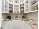 Walk-in pantry featuring custom built-in shelves and butcher block countertops at 2793 Bloom Cir, Dacula, GA 30019