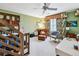 Inviting bedroom with a bunk bed, ceiling fan, and sitting area, ideal for a space at 4620 Wieuca Ne Rd # 42, Atlanta, GA 30342
