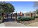 Community pool with a gated entrance, umbrellas, and comfortable seating, perfect for summertime enjoyment at 4620 Wieuca Ne Rd # 42, Atlanta, GA 30342
