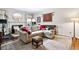 Comfortable living room with plush seating, fireplace, and neutral tones, offering a relaxing and inviting atmosphere at 4620 Wieuca Ne Rd # 42, Atlanta, GA 30342
