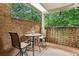 Charming brick patio with seating area, offering a cozy outdoor space for relaxation at 4620 Wieuca Ne Rd # 42, Atlanta, GA 30342
