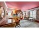 Bright playroom with textured walls, pink ceiling, patterned carpet, and creative storage solutions, perfect for children at 4620 Wieuca Ne Rd # 42, Atlanta, GA 30342
