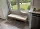 A cozy nook featuring a modern bench seat by a window, perfect for relaxation at 2135 Niskey Lake Sw Rd, Atlanta, GA 30331