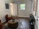 Cozy living room featuring a round coffee table, accent chairs, and modern decor at 2135 Niskey Lake Sw Rd, Atlanta, GA 30331
