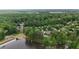 Aerial view of mature trees, a lake, and homes in a lovely neighborhood at 2548 Lakeview East Se Trl, Atlanta, GA 30316