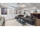 Basement sitting area featuring a comfortable grey sectional sofa, a fireplace and media console at 2548 Lakeview East Se Trl, Atlanta, GA 30316