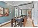 Dining room showcasing hardwood floors, decorative artwork, and an opening to the kitchen at 2548 Lakeview East Se Trl, Atlanta, GA 30316