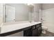 Bathroom featuring a spacious vanity with a sink and storage space with tub-shower combo at 345 Lara Ln, Mcdonough, GA 30253