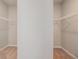 Walk-in closet with carpeted floor and shelving at 345 Lara Ln, Mcdonough, GA 30253