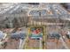 Aerial view showcasing the property's lot size, proximity to the new neighborhood, and surrounding landscape at 5774 Forest Dr, Acworth, GA 30102