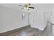 The bedroom is spacious with gray vinyl flooring, neutral paint and has ample closet space at 5774 Forest Dr, Acworth, GA 30102