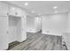 Spacious kitchen boasting abundant storage, modern floors, and sleek cabinetry at 5774 Forest Dr, Acworth, GA 30102