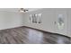 Living room features a large window, new flooring, fresh paint, and ample natural light at 5774 Forest Dr, Acworth, GA 30102