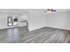 Bright living room with light gray hardwood floors and a ceiling fan at 5774 Forest Dr, Acworth, GA 30102