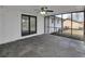 Covered porch with stone flooring and brick accent walls at 5774 Forest Dr, Acworth, GA 30102