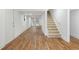 Spacious basement with staircase, painted walls and floors, and great natural light at 1019 Crestwood Ln, Stone Mountain, GA 30087