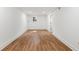 Unfinished basement space features wood-look flooring and a small window for natural light at 1019 Crestwood Ln, Stone Mountain, GA 30087
