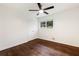 Clean bedroom with hardwood floors, closet and a window offering natural light at 1019 Crestwood Ln, Stone Mountain, GA 30087