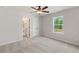 Bedroom featuring neutral walls, carpet flooring, and large windows at 1651 Tide Mill Rd, Cumming, GA 30040