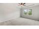 Bedroom featuring neutral walls, carpet flooring, and windows at 1651 Tide Mill Rd, Cumming, GA 30040