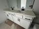 Bathroom vanity with double sinks, sleek black hardware, and ample counter space at 1714 Gunnin Nw Trce # 237, Atlanta, GA 30318