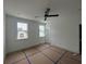 Spacious bedroom with fan, bright windows, and neutral finishes offering a serene atmosphere at 1714 Gunnin Nw Trce # 237, Atlanta, GA 30318