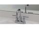 Close-up of a chrome Moen faucet at 1714 Gunnin Nw Trce # 237, Atlanta, GA 30318