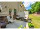 Serene patio features comfortable seating and attractive landscaping, perfect for outdoor enjoyment at 221 Irwell Path, Lawrenceville, GA 30044