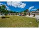 Community street view with well-maintained lawns and attractive townhome exteriors at 221 Irwell Path, Lawrenceville, GA 30044
