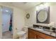 Nicely decorated bathroom with granite vanity and framed mirror at 4101 Dunwoody Club Dr # 49, Atlanta, GA 30350