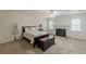 Bedroom with a decorative fireplace, ceiling fan, and bright natural light at 4101 Dunwoody Club Dr # 49, Atlanta, GA 30350