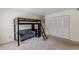 Bedroom featuring a loft bed with a sofa, and a double closet at 4101 Dunwoody Club Dr # 49, Atlanta, GA 30350